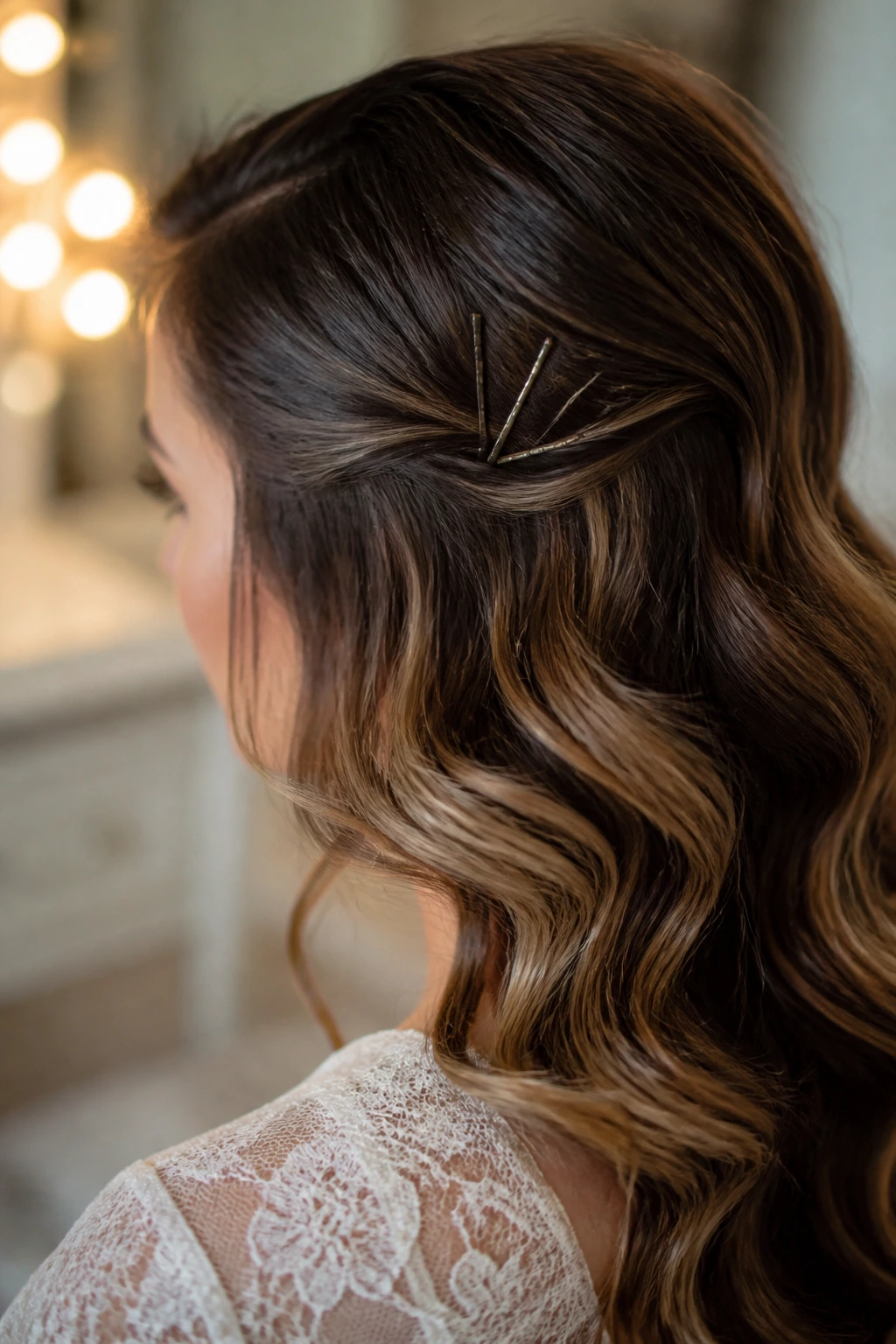 Bride with pinned waves ready for make-ahead styling