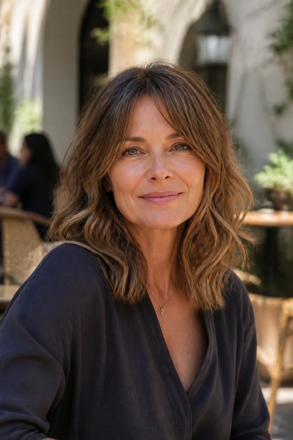 Close-up of a real woman with natural waves and air-dried layers