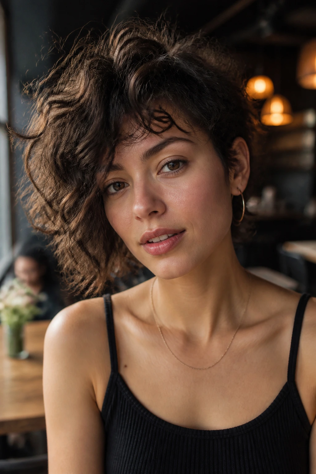 Close-up portrait of a real person with asymmetrical curly shag