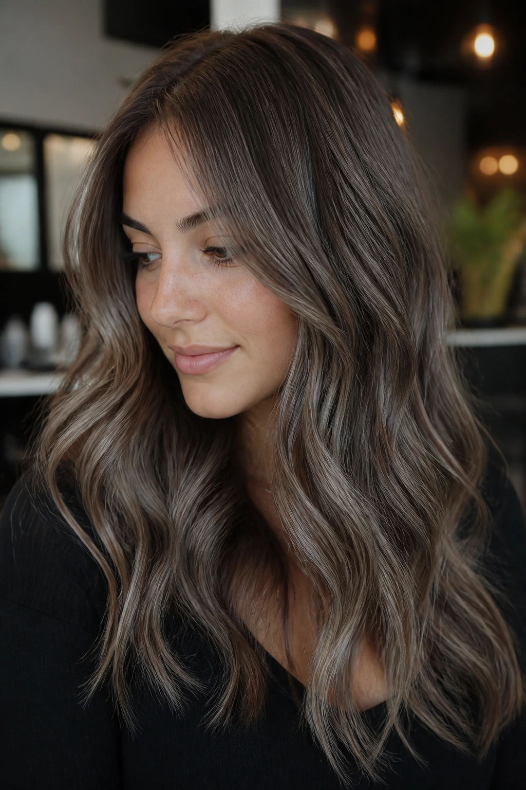 Cool brunette with mushroom brown balayage close-up