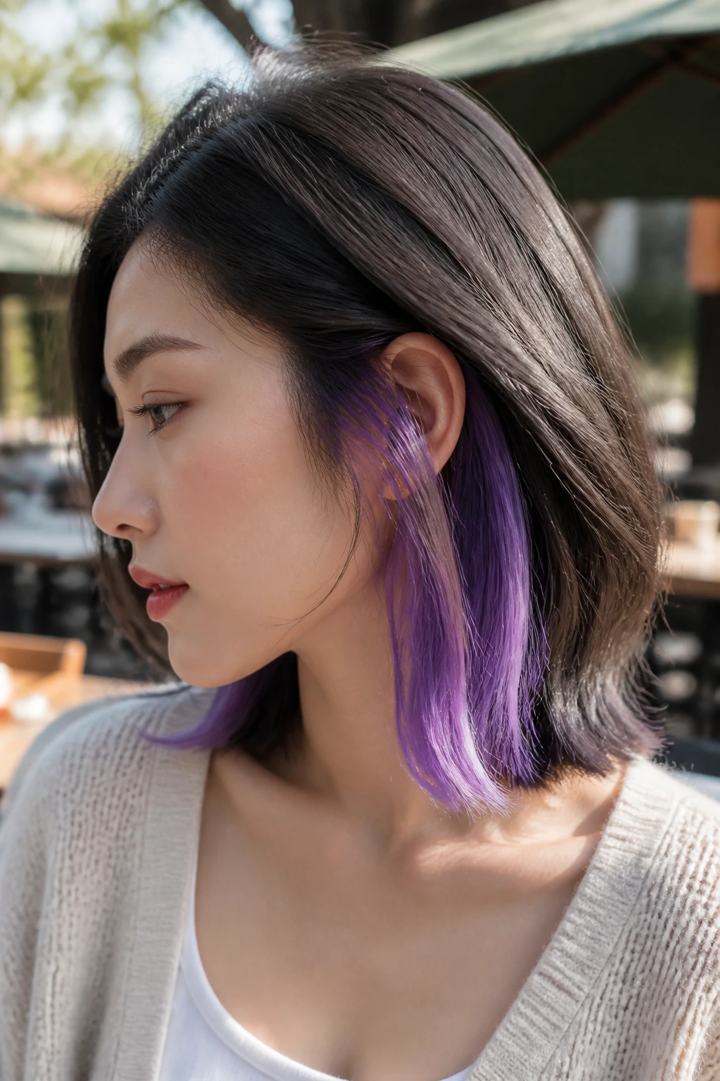 Close-up showing lavender teal underlayer peeking from under top layer