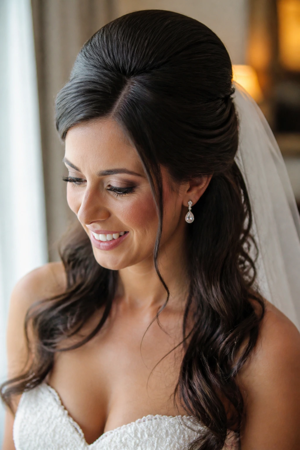 Close-up of a real bride with a beehive half-up hairstyle and crown volume
