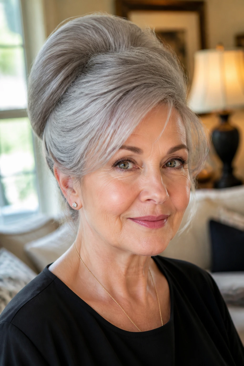 Close-up of an older woman with bouffant hairstyle in a cozy living room