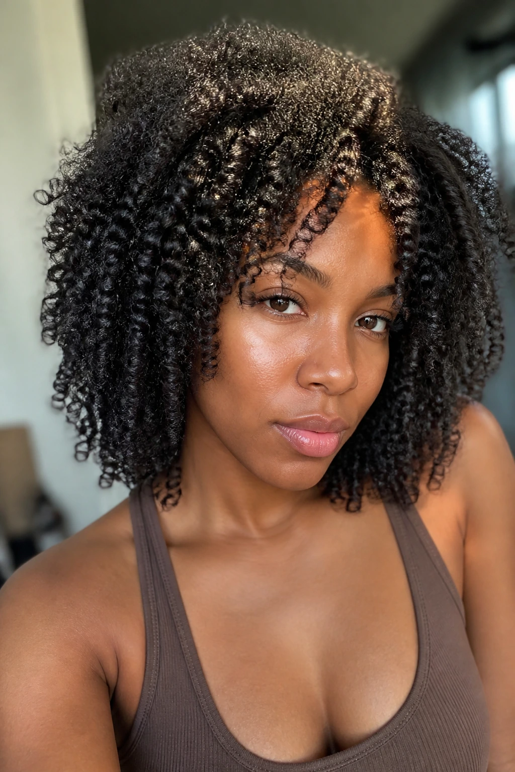 Real woman with braid-out and fluffy roots