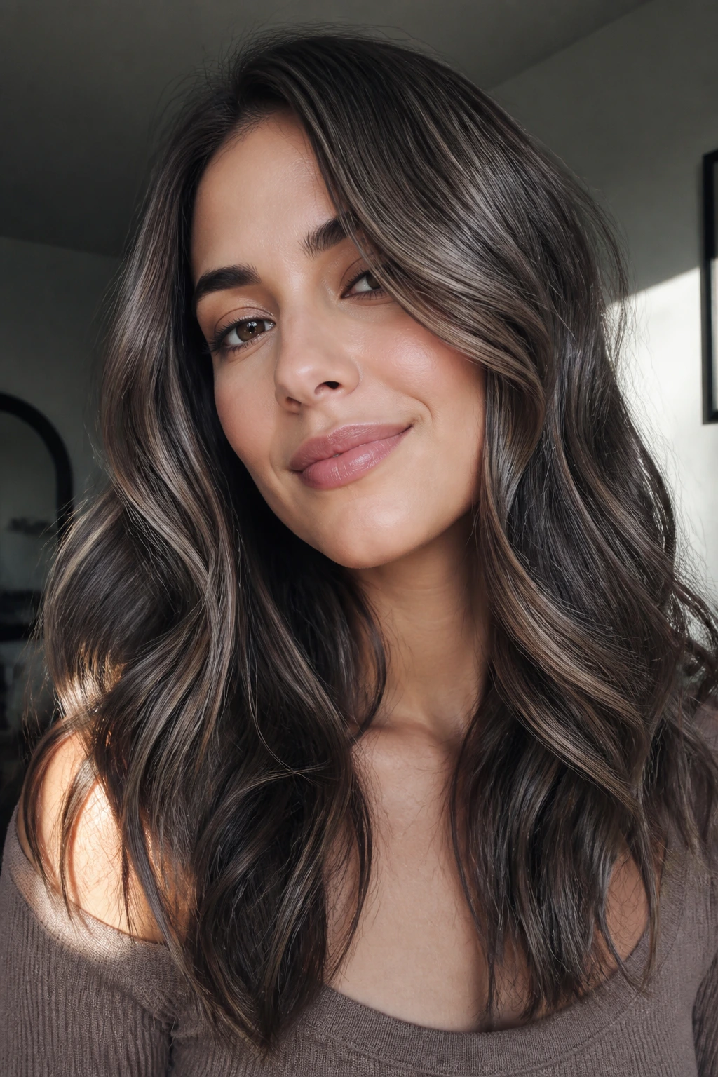 Portrait of a real person with cool smoke brunette tones and ash highlights