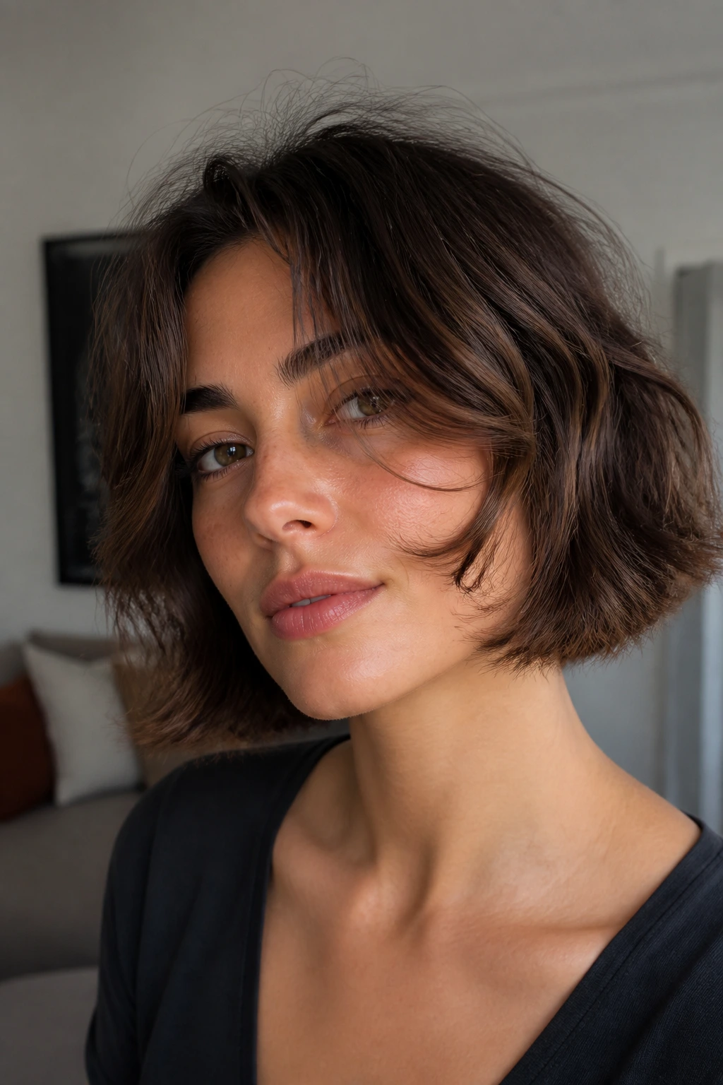 Close-up of a woman with cheekbone-length bob and flip on the front
