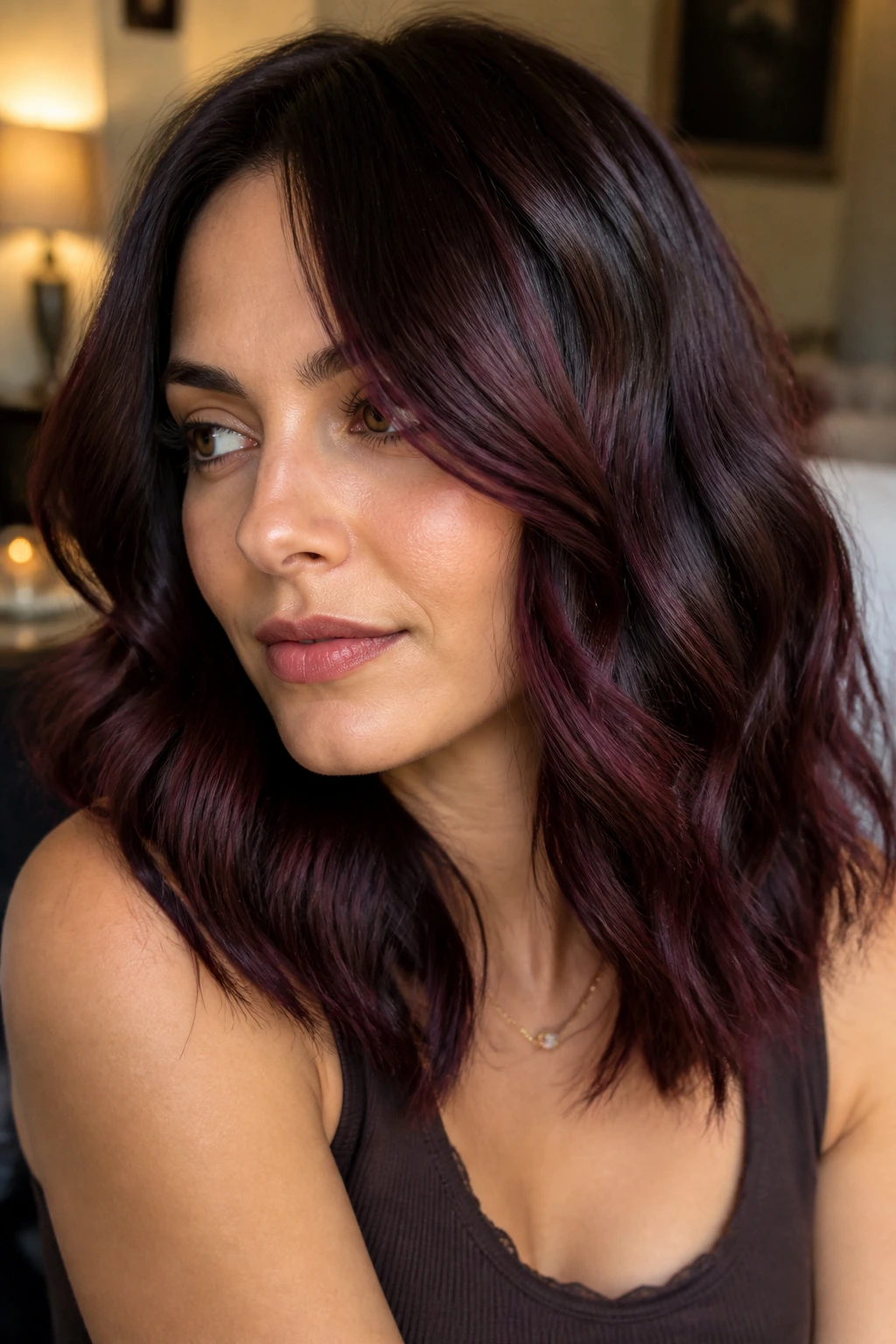 Close-up of cherry cola brunette with wine sheen