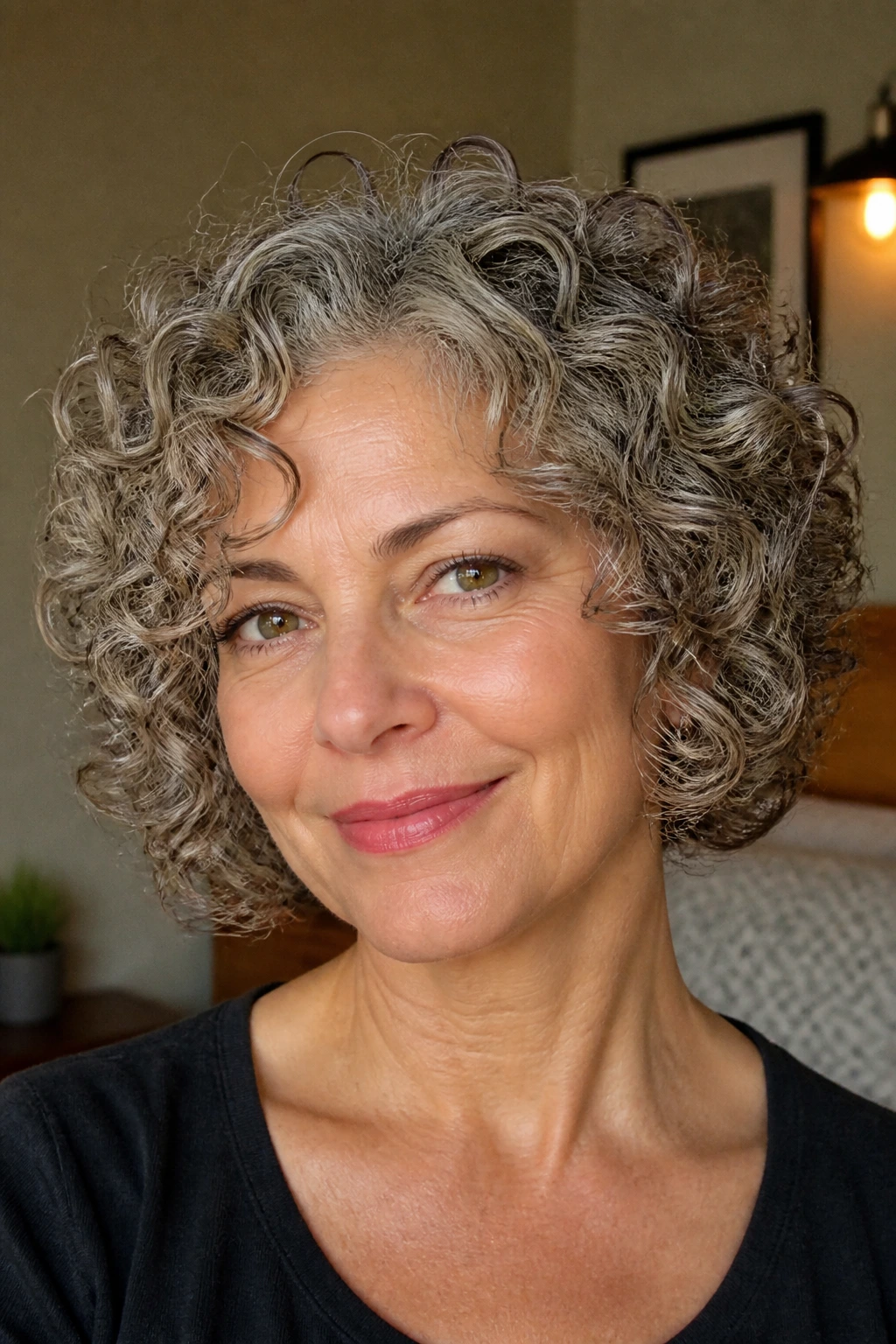 Close-up of a real woman with chin-length rounded curls