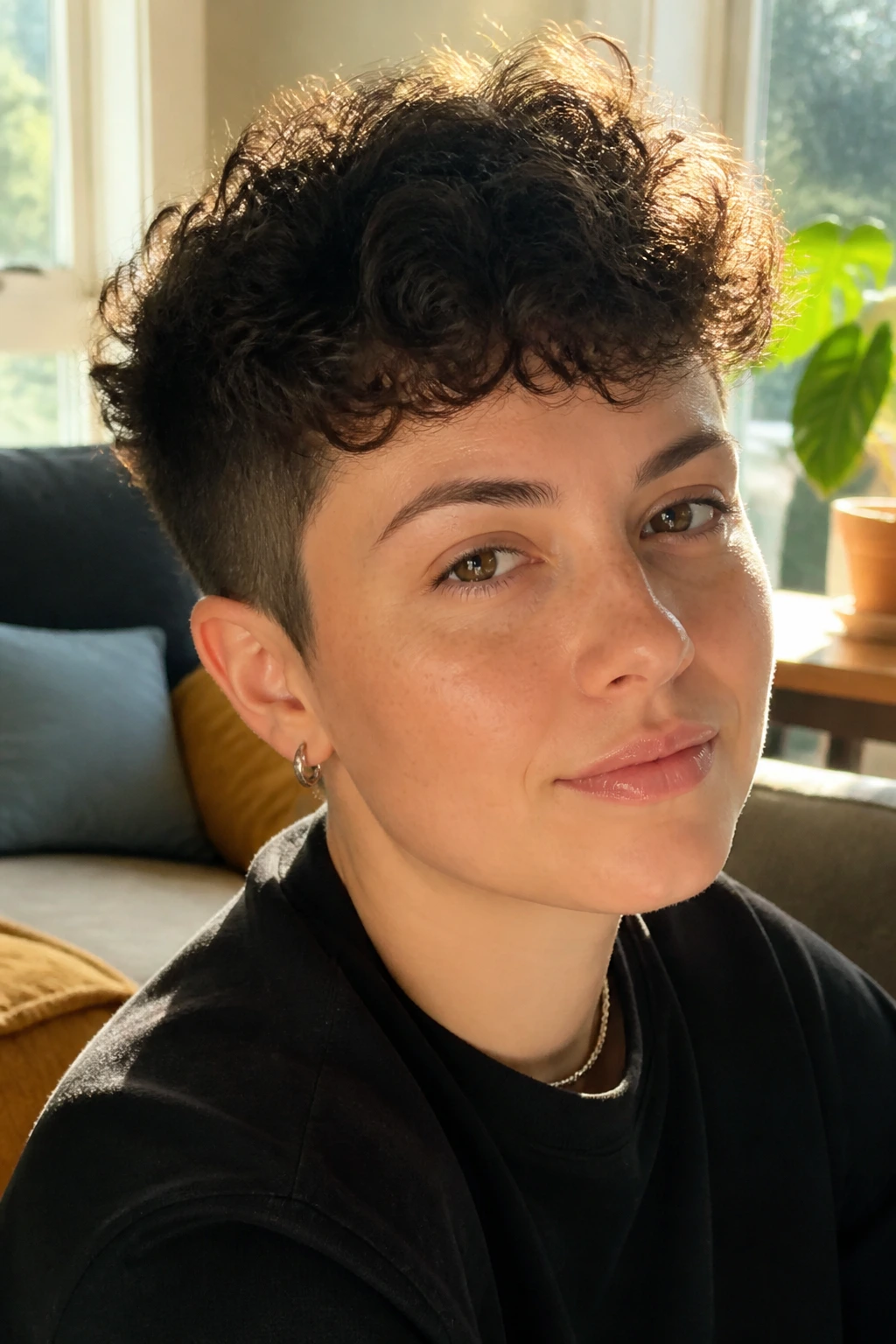Close-up of a real person with curly crop and soft edge