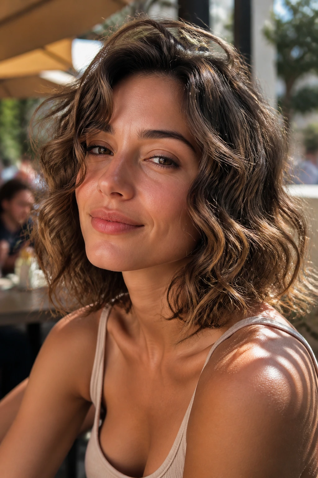 Real woman with curly lob beach waves.