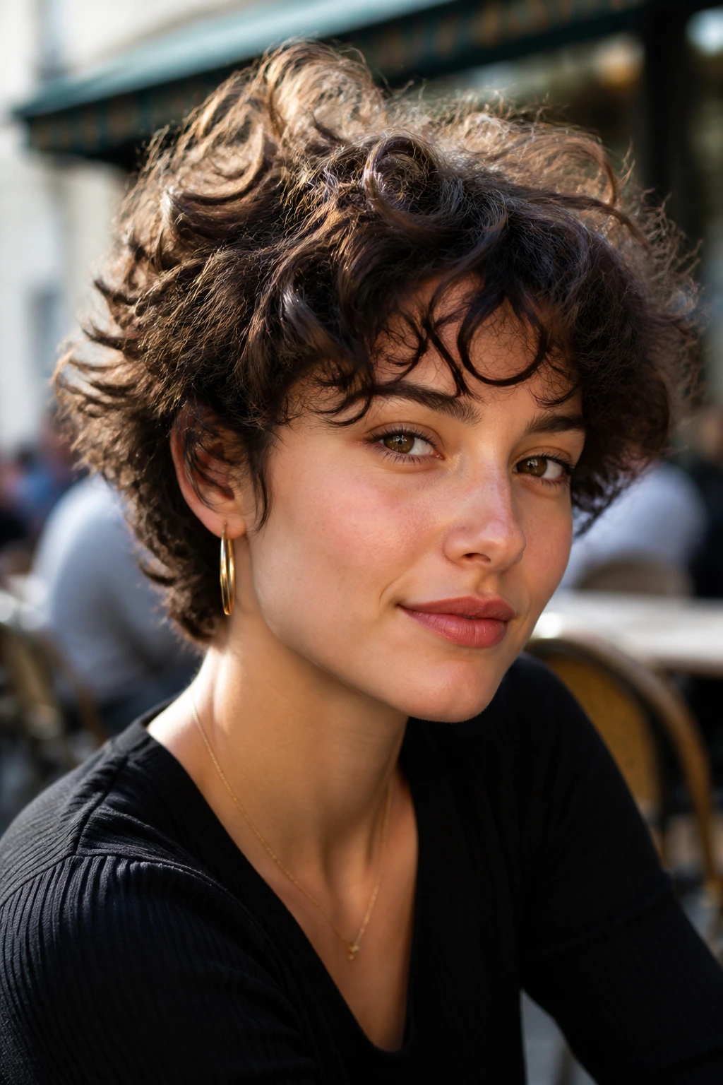 Close-up of real person with curly shag crop outdoors