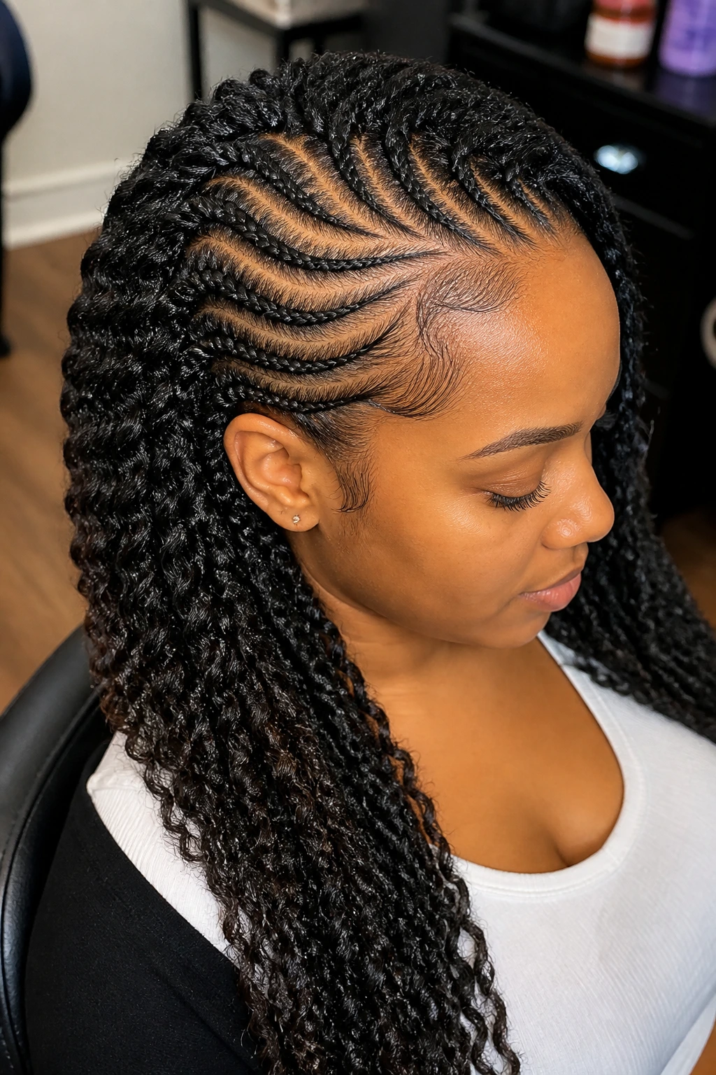 Close-up of a real woman with curved cornrow base passion twists