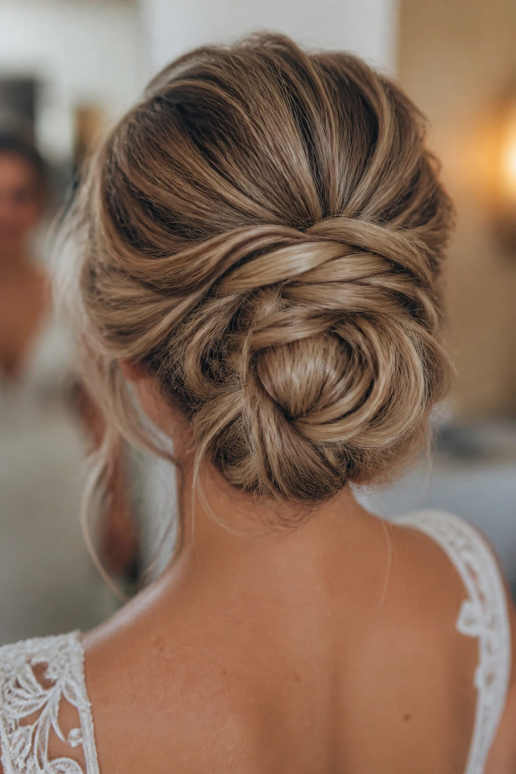Portrait of a bride's dance-ready bun with a secure base and crossed pins