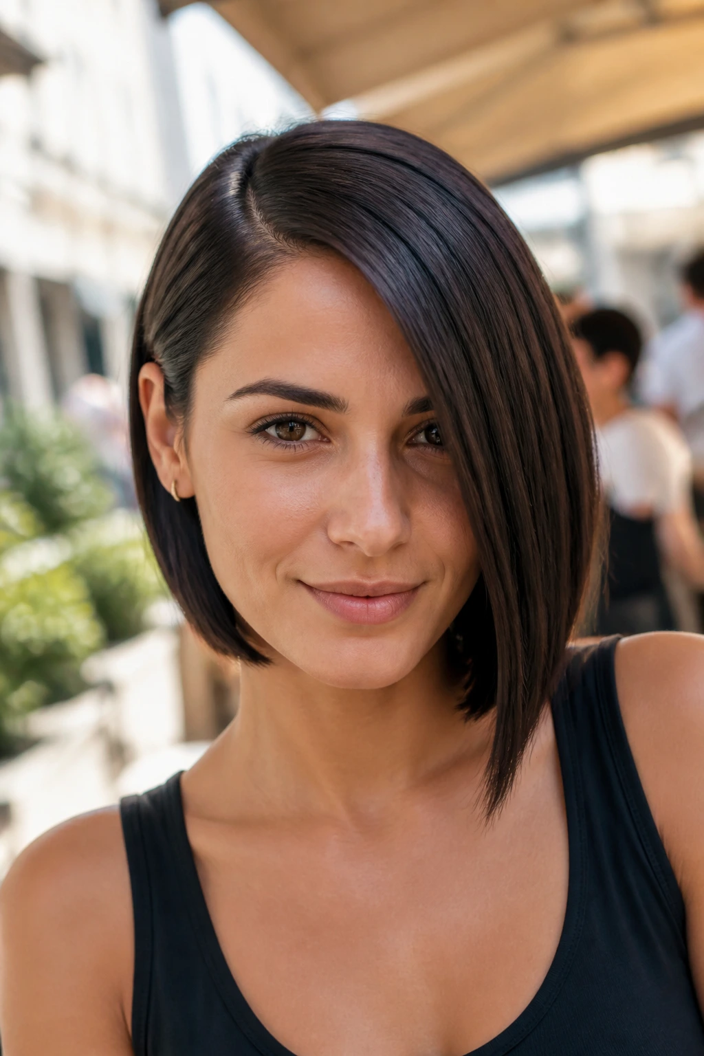 Portrait of a real woman with a deep side-parted bob diagonally across the face
