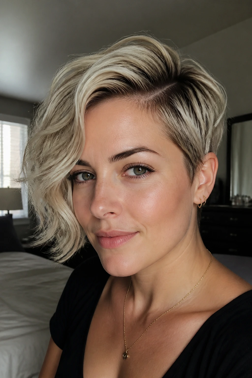 Close-up portrait of a real woman with deep side-part pixie hairstyle