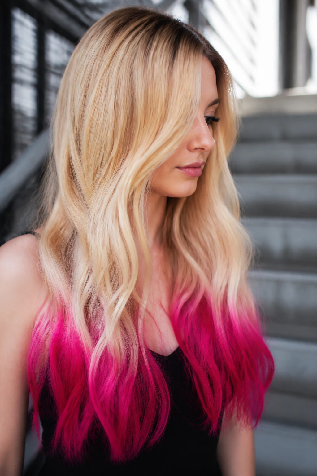 Close-up of dramatic dip-dye ombre with bold end colors on long hair