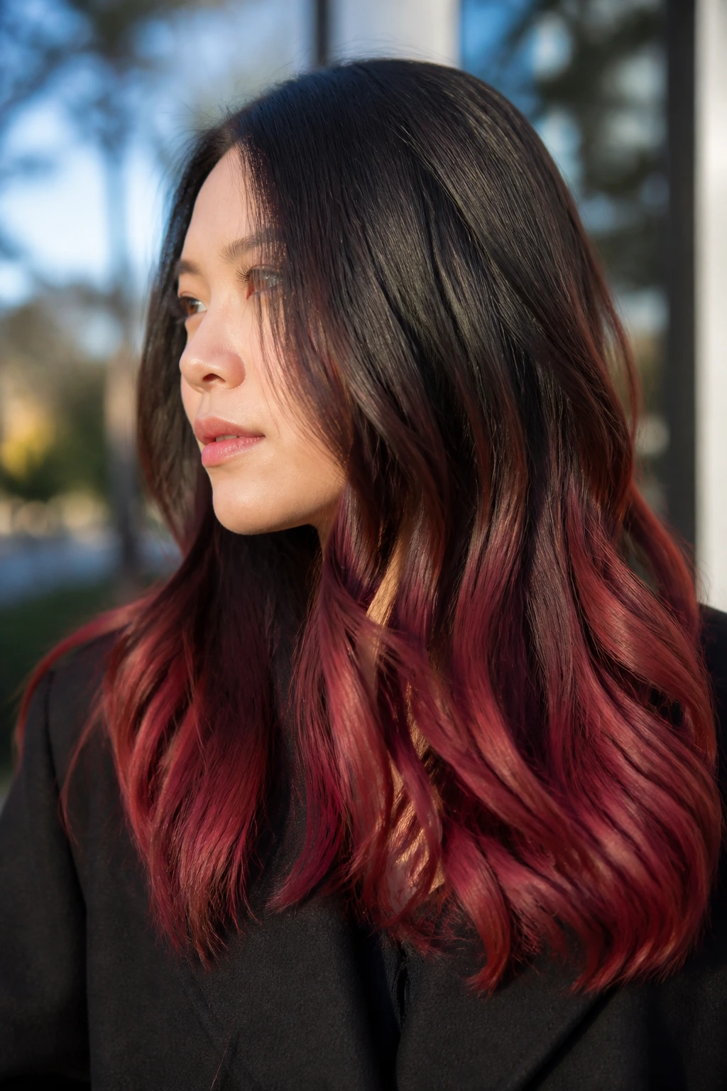 Portrait showing a durable ombre fade with defined root, mid, and end tones