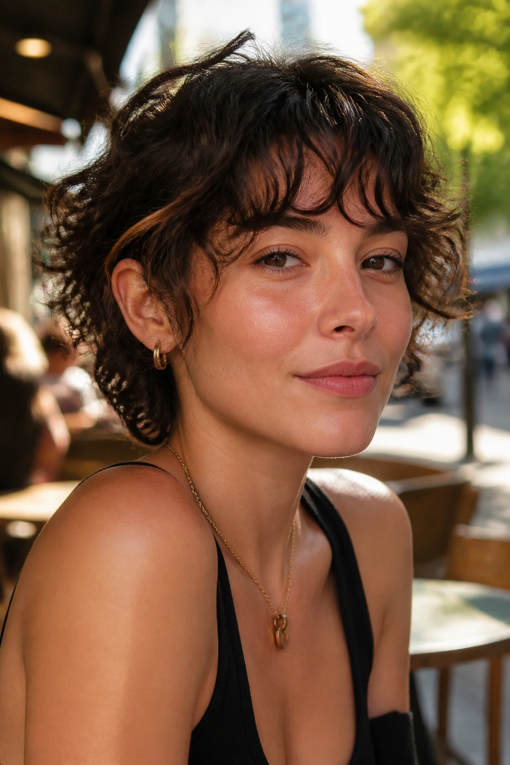 Close-up of real person with ear-length shag and peekaboo bangs outdoors