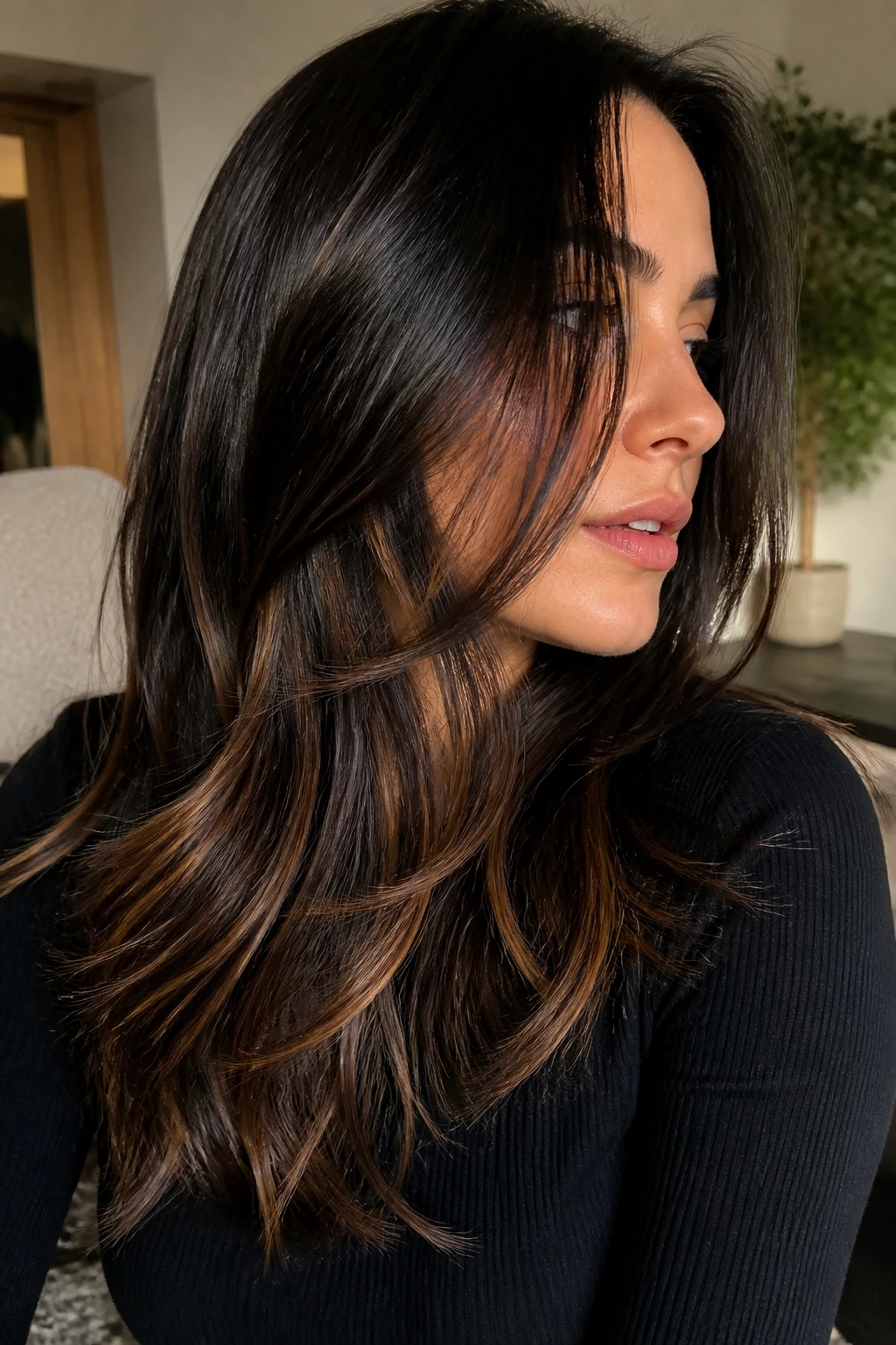 Close-up portrait of a real woman with espresso bronze underlights in natural light