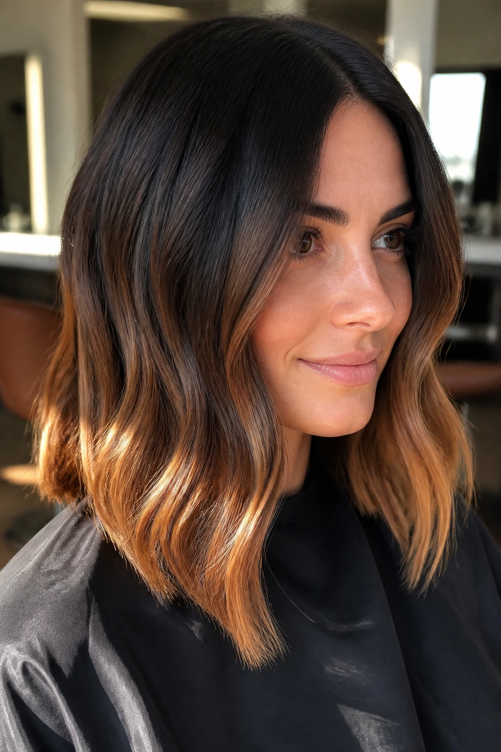 Espresso to caramel ombre on shoulder-length hair in a close-up