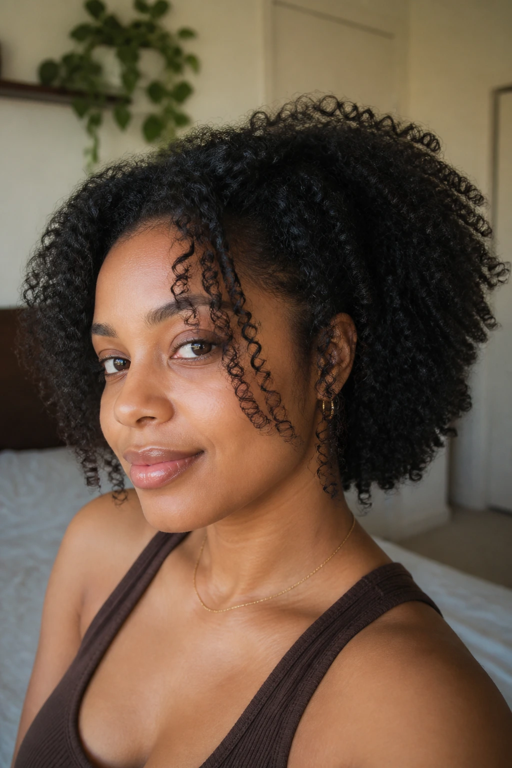 Close-up of a real person with face-framing feathered layers around the cheeks
