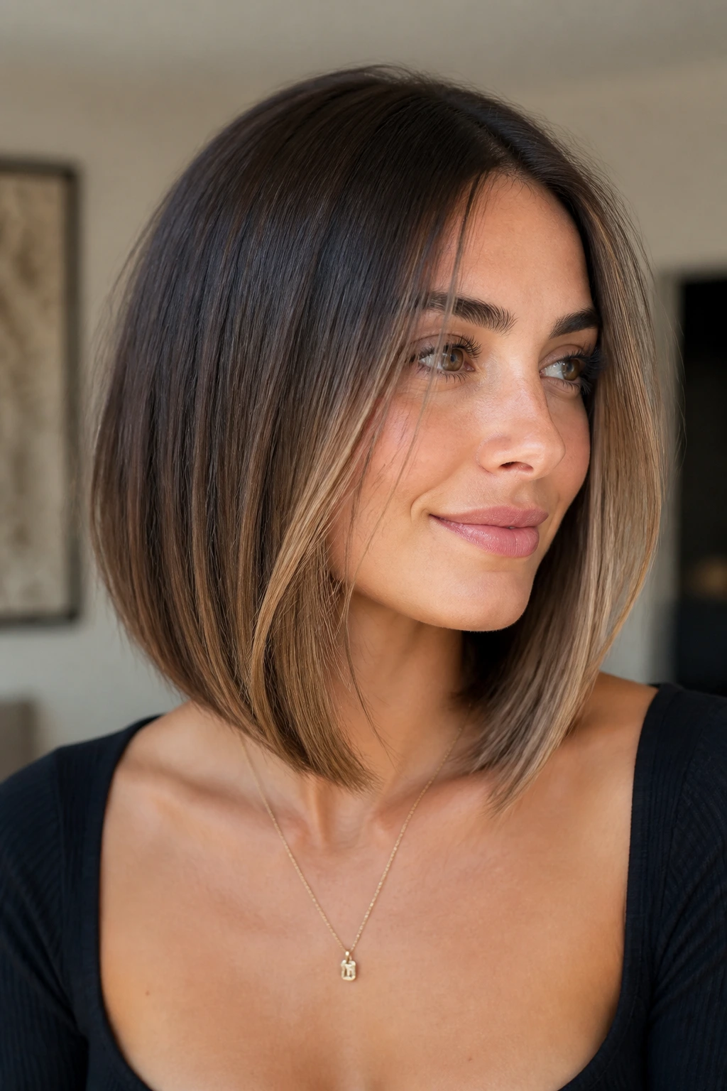 Face-framing lob on a real woman with front pieces around the chin