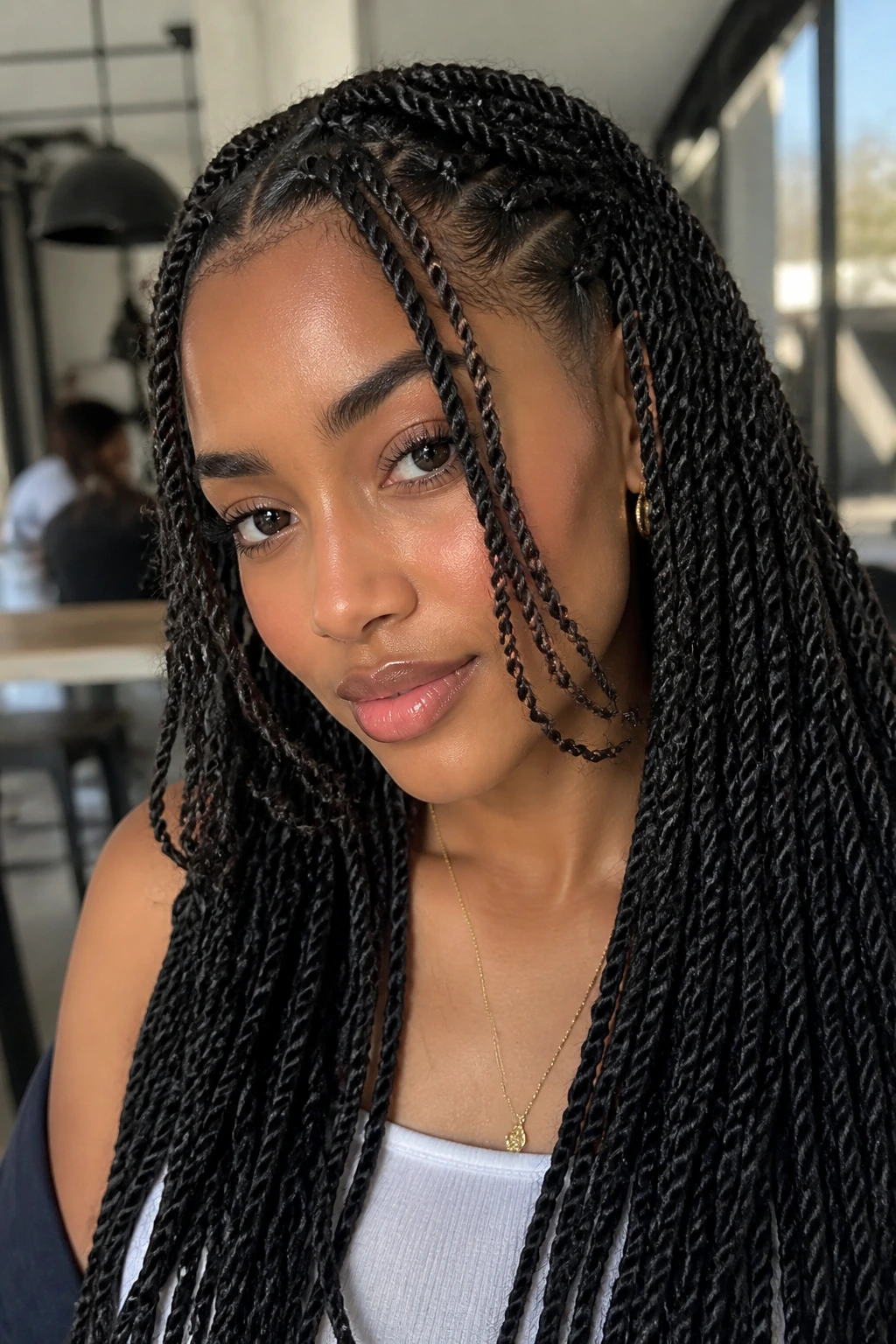 Close-up of face-framing twists on a real person