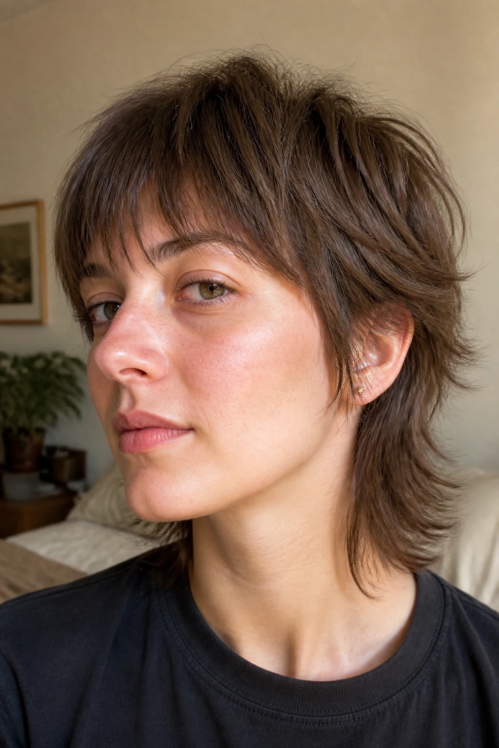 Close-up portrait of real person with fine-hair airy wolf mullet.