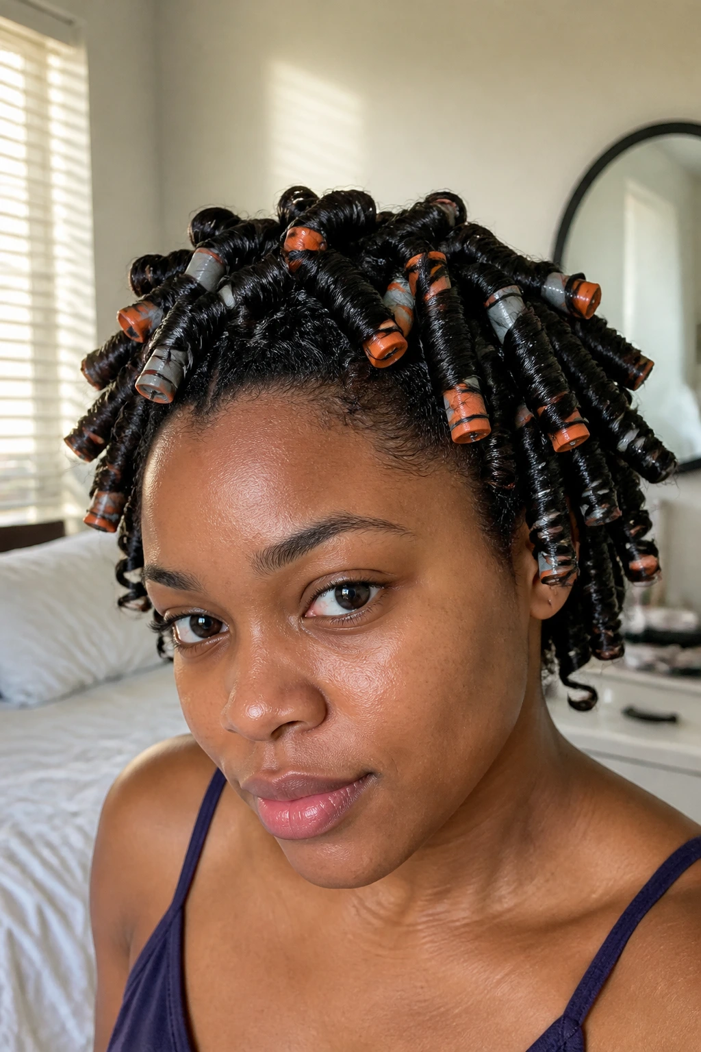 Close-up of a real woman with flexi-rod spiral coils on her hair