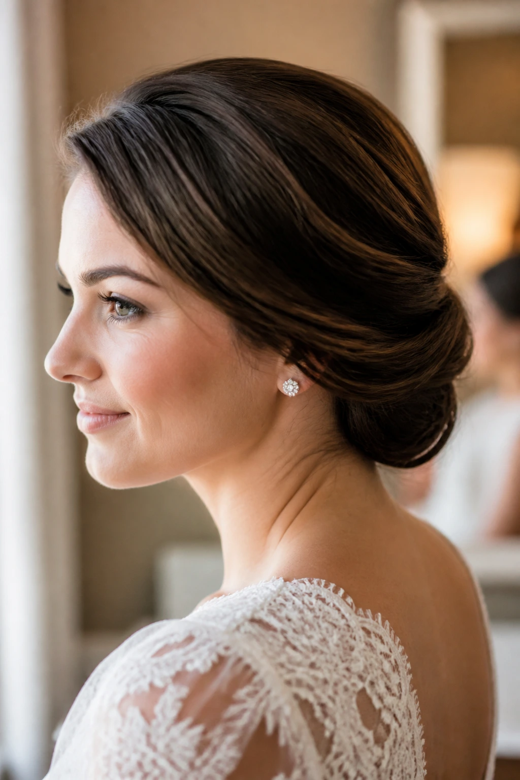 Close-up of bride with Gibson Tuck at the nape for a soft, classic bridal look