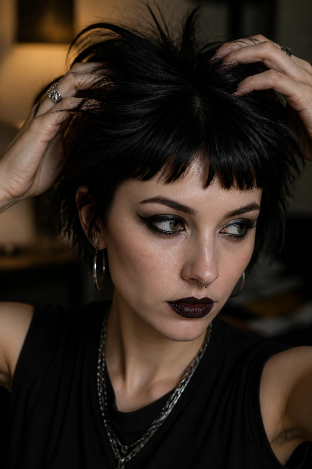 Goth short hair with edgy fringe being styled.