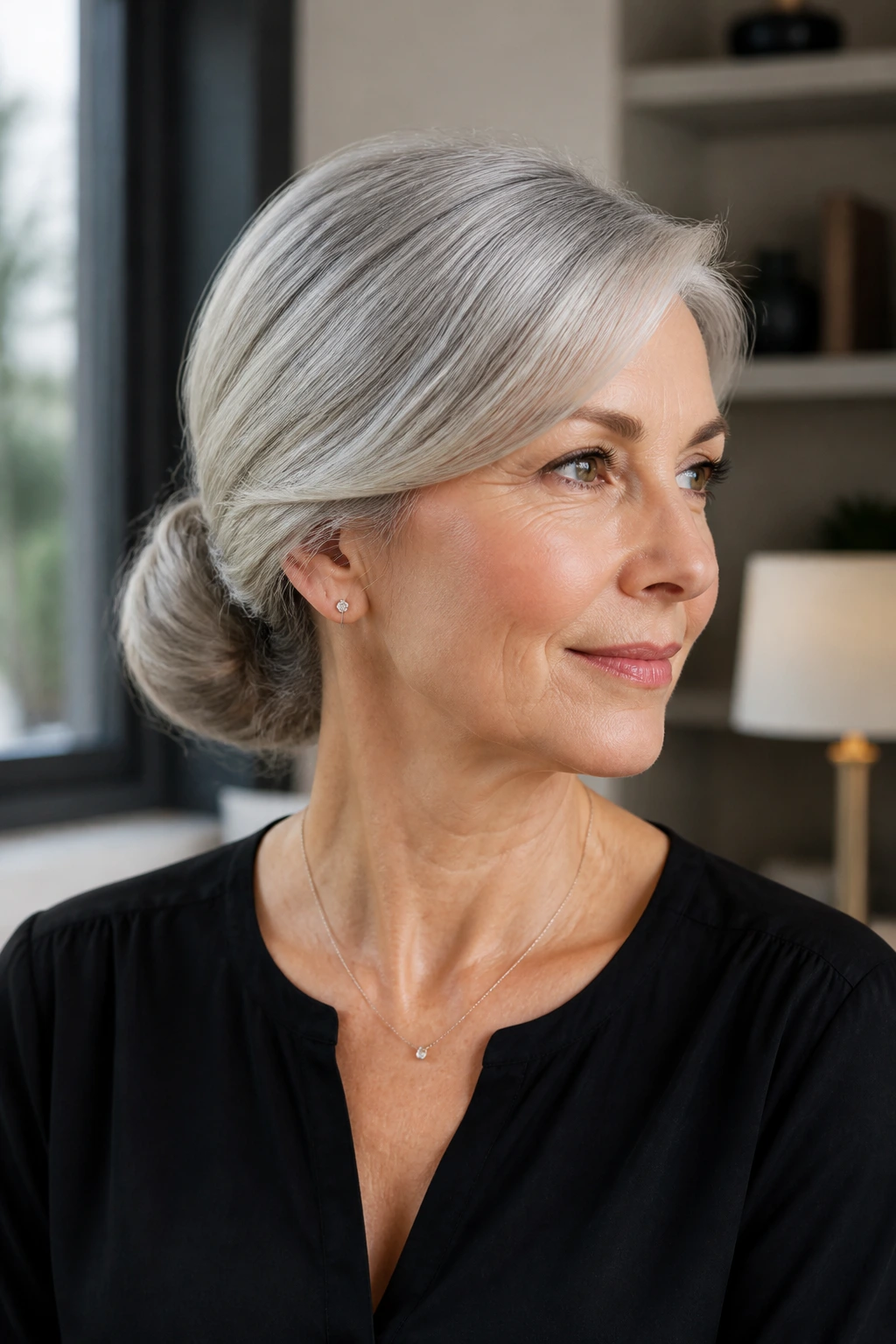 Portrait of a real woman with sleek low bun and side sweep