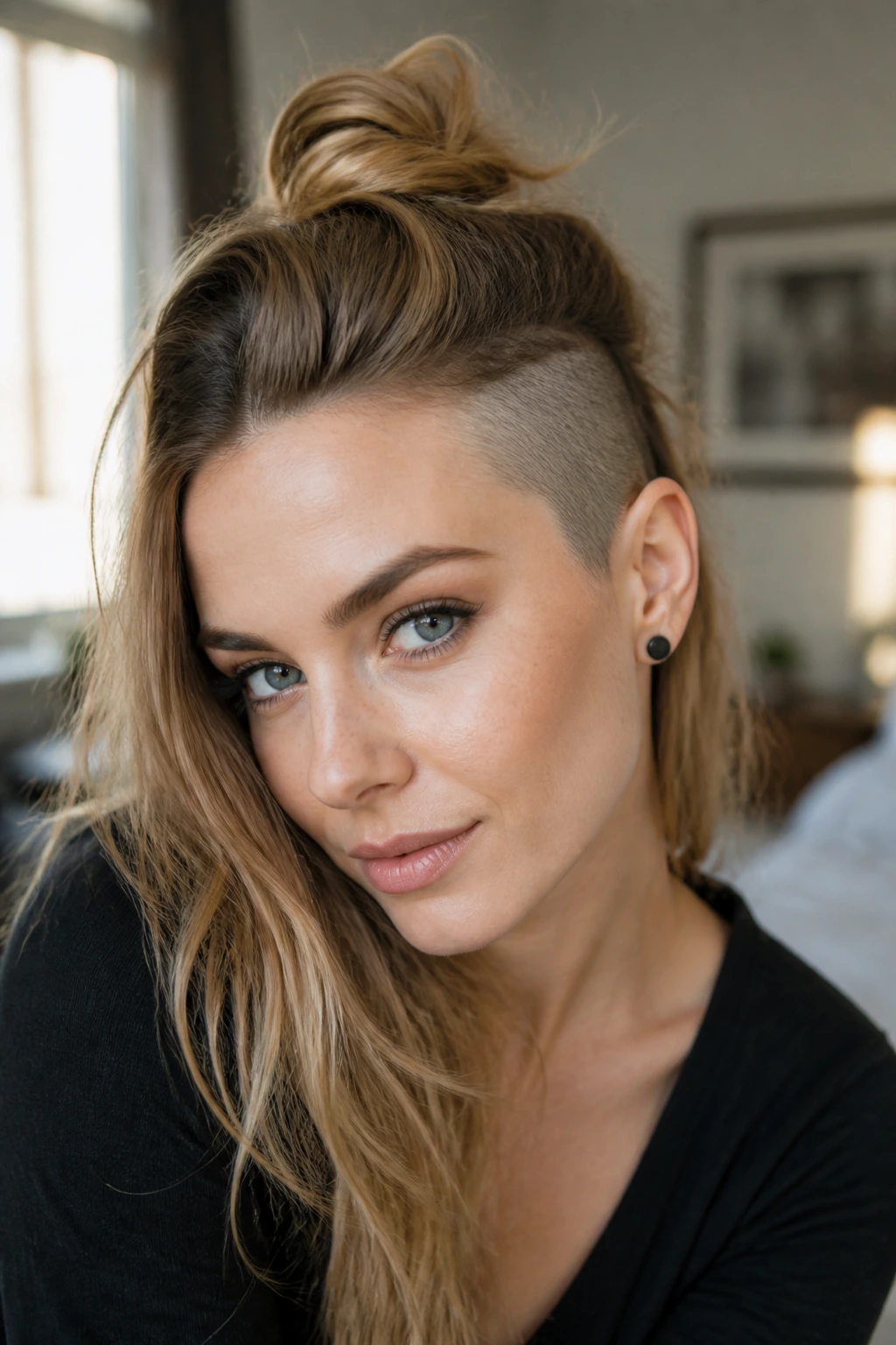 Real woman with half-up top knot and shaved side