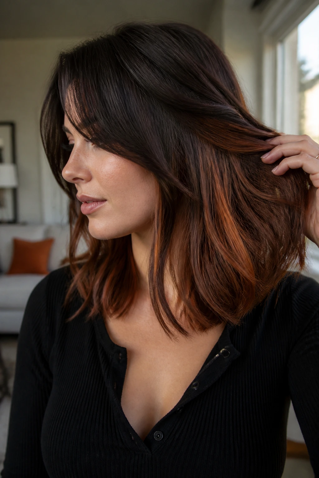 Close-up of a real woman showing hidden copper panels under dark brunette hair.