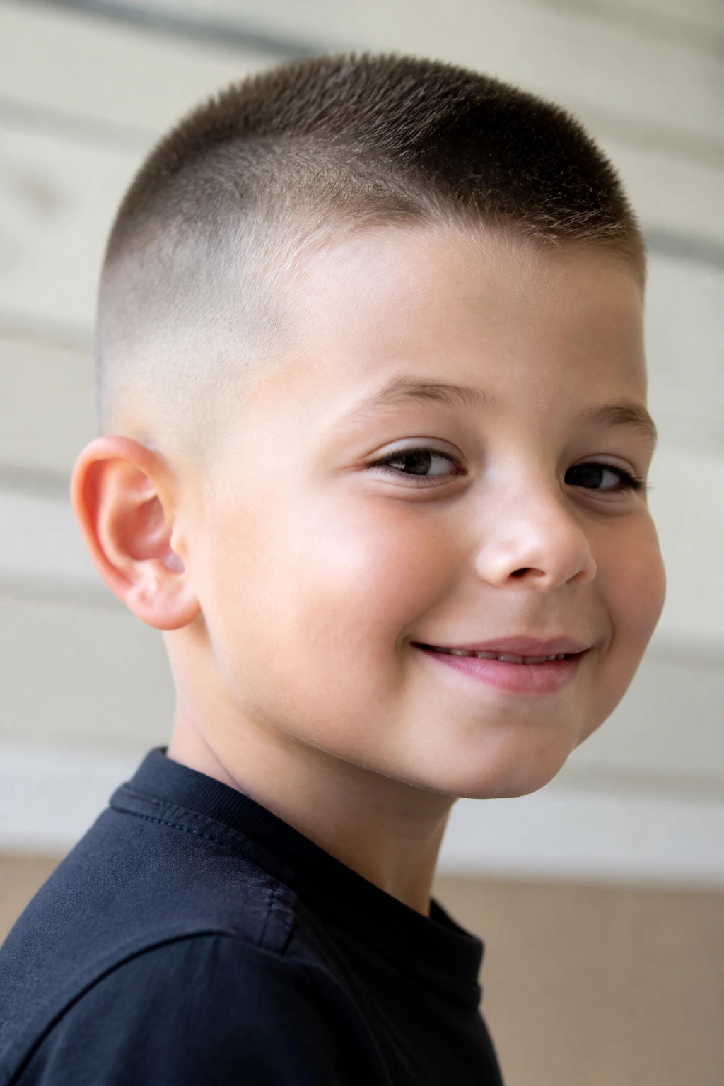 Close-up of a child with a high and tight haircut