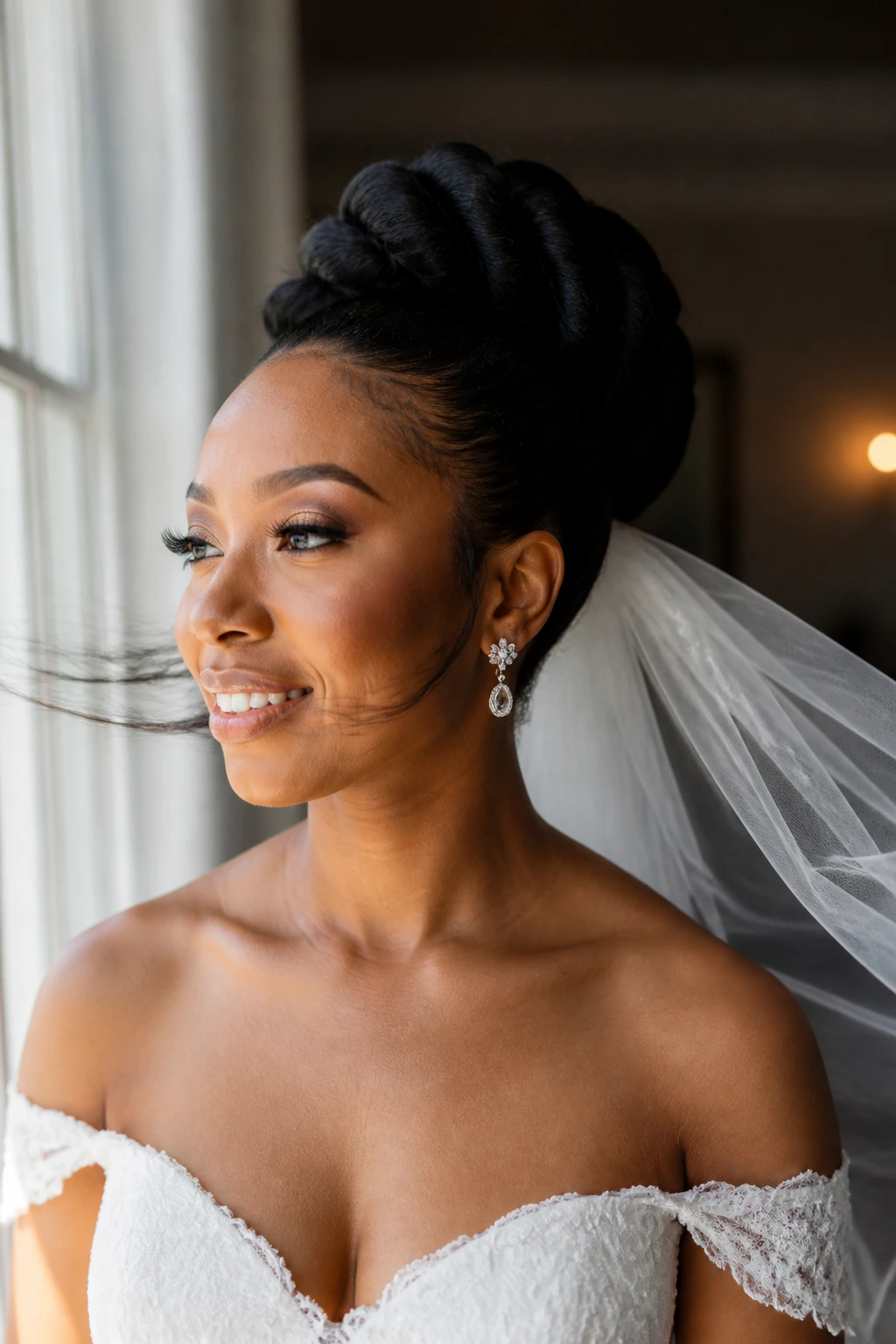 Close-up of a Black bride with a sculpted, shape-holding updo.
