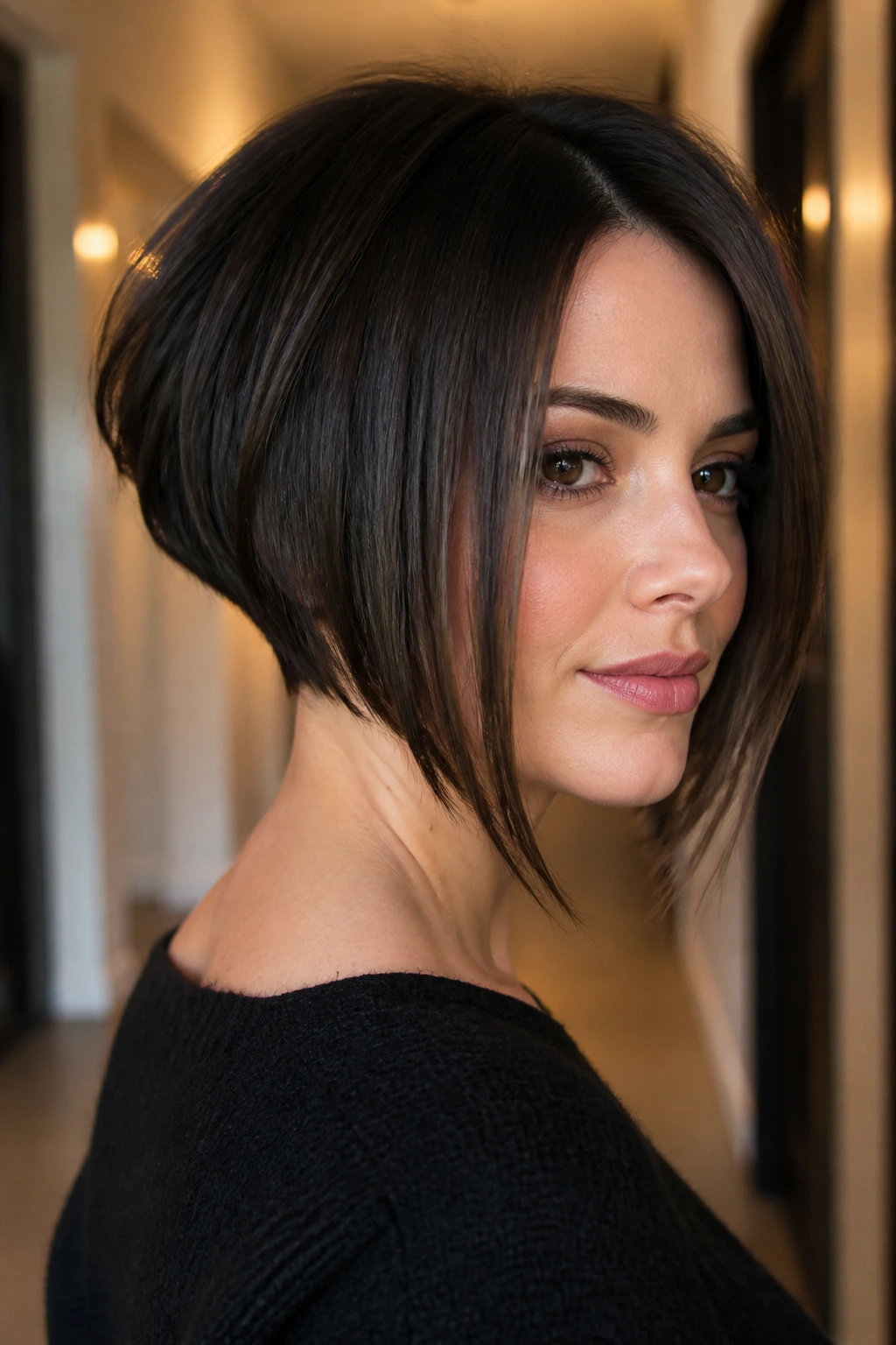 Real woman with inverted asymmetrical bob showing shorter back