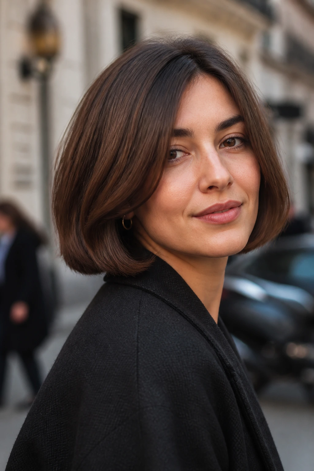 Real woman with an Italian bob and fuller ends on a city street