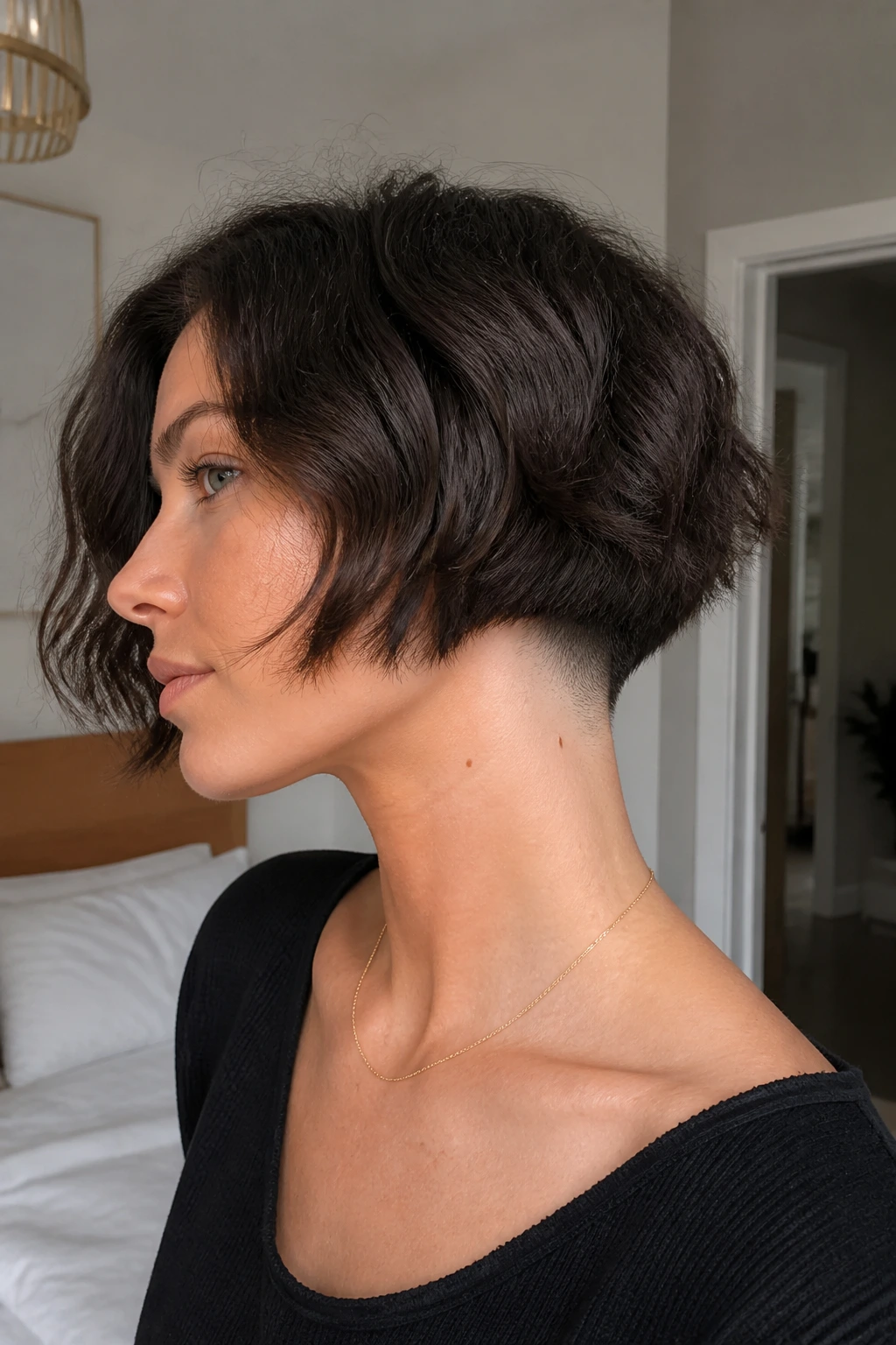 Close-up portrait of real woman with jaw-length bob and undercut