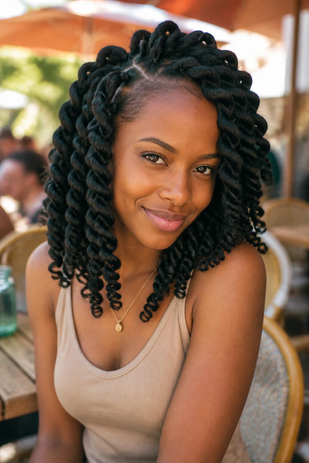 Close-up portrait of a person with jumbo spring twists