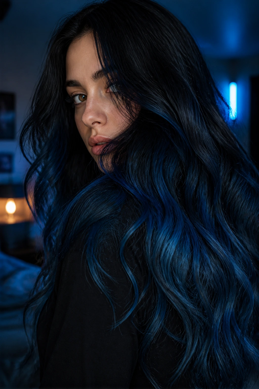 Close-up of near-black hair with hidden lagoon blue highlights