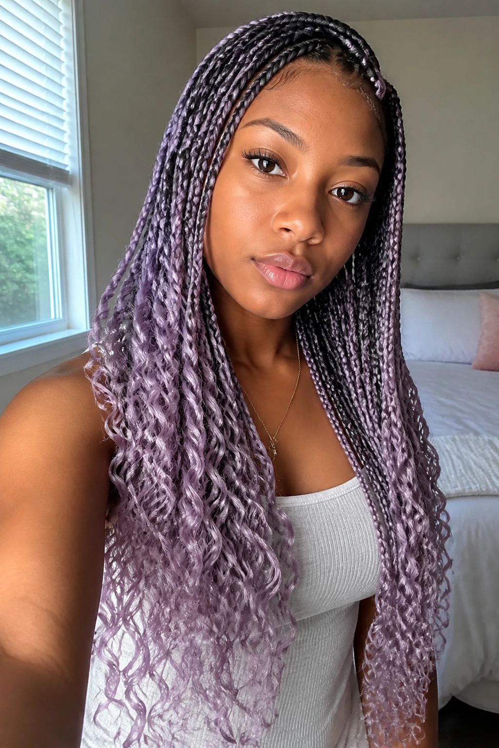 Close-up of a real person with lavender goddess braids