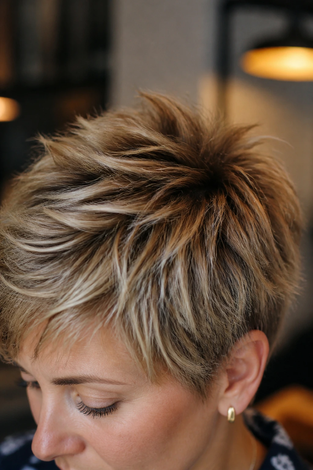 Close-up of crown lift and texture on pixie haircut.