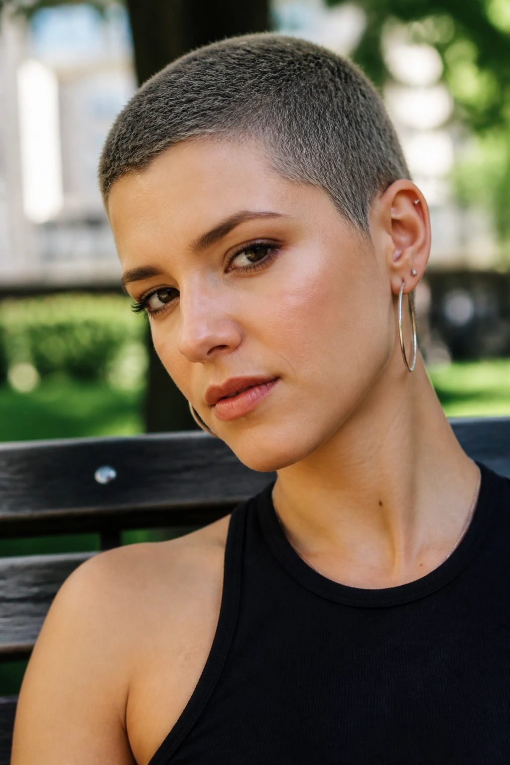 Close-up of a real person with a matte textured buzz cut