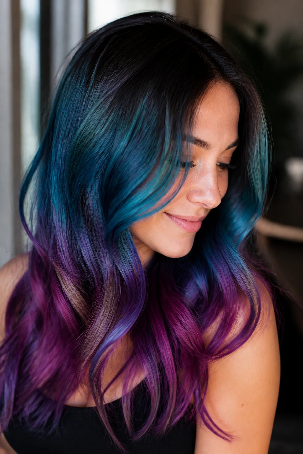 Portrait of a real person with glossed mermaid color and subtle root shadow