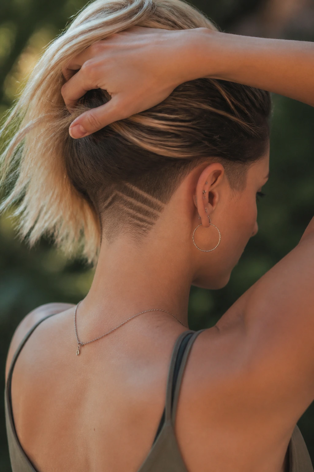 Close-up of a woman with micro-pattern undercut at the nape