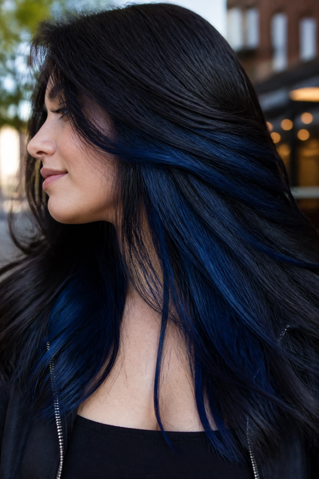 Dark hair with midnight blue peekaboo panels visible
