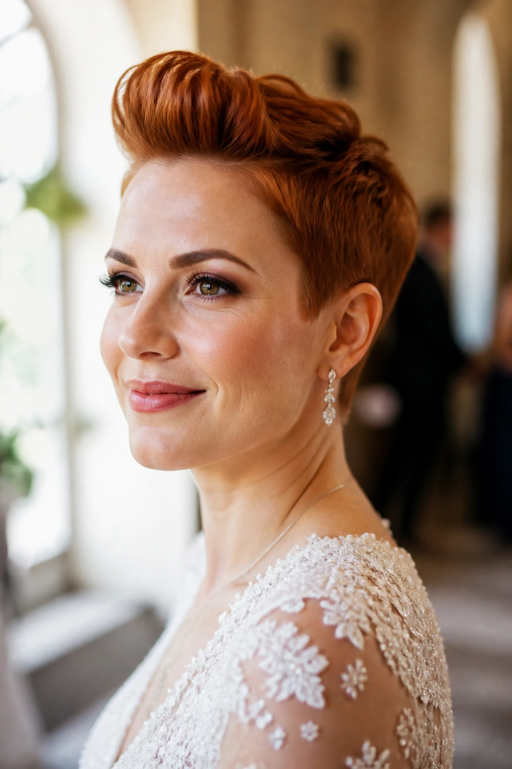 Close-up of a bright auburn pixie with a mini pompadour