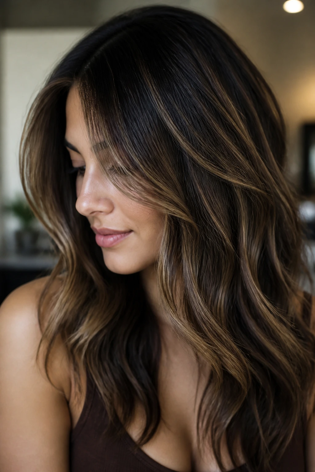 Dark brown hair with mocha and beige babylights for texture.