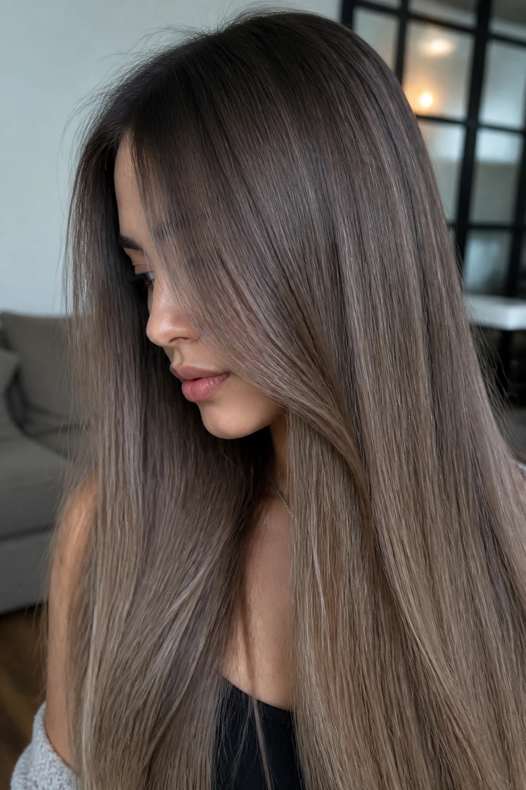 Long straight hair in mushroom brown melt with cool beige-ash tones
